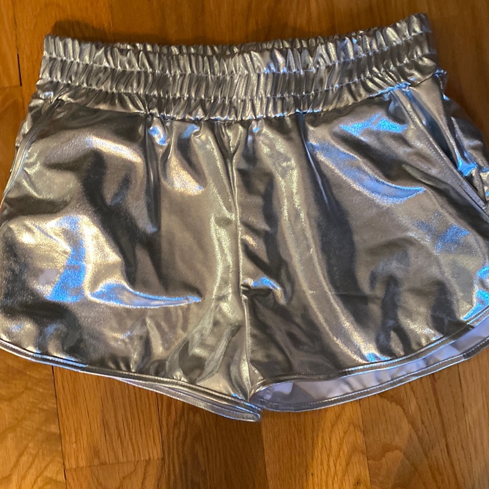 Silver shorts. Purchased for Halloween costume. Never worn. Size M but run small